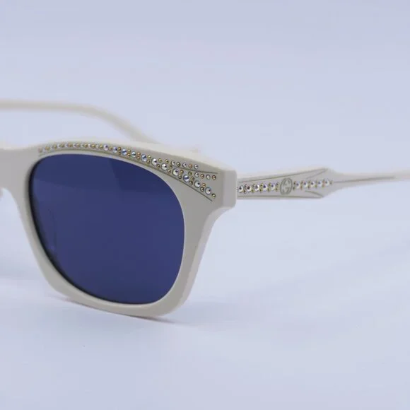 Gucci GG1299S 004 Sunglasses Ivory with Stones Cat Eye Frame, Blue Lenses